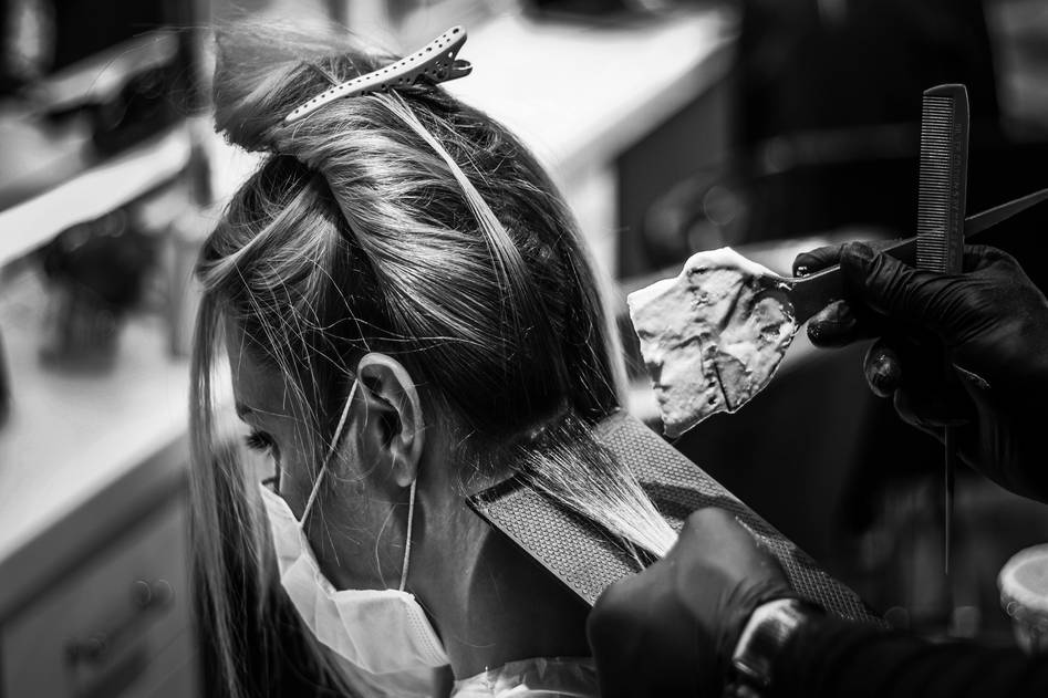 Close-up of beautifully styled hair with balayage highlights in warm caramel tones
