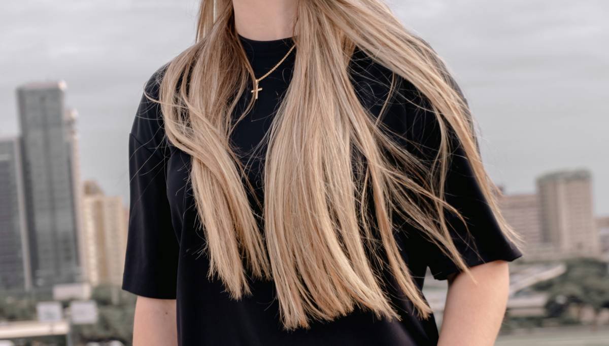Side-by-side comparison: traditional foil highlights vs. hand-painted balayage showing softer grow-out and natural blending