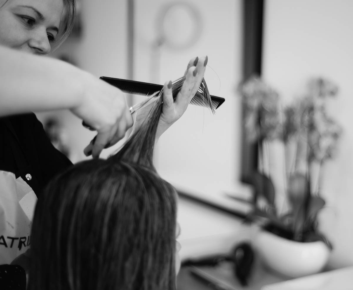 Close-up of balayage hair sleek showing seamless blend on straight, glossy strands